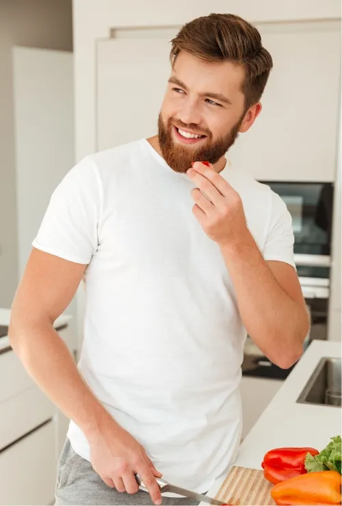 vertical-image-of-smiling-bearded-man-standing-nea-2026-01-09-14-39-42-utc